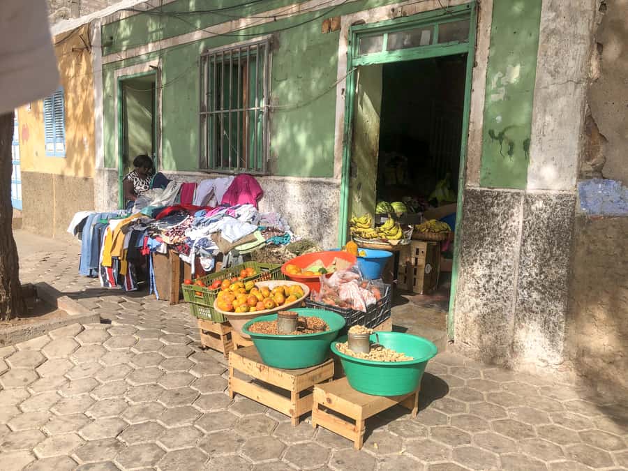 Mindelo: Private Walking Tour with Local Food Tasting - Local shops, grogue, coffee, and souvenirs