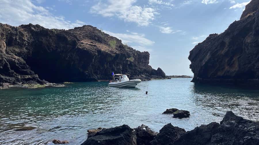 Tarrafal: Aguas Belas Caves Boat Tour with Snorkeling - Starting from Tarrafal and finding the boat